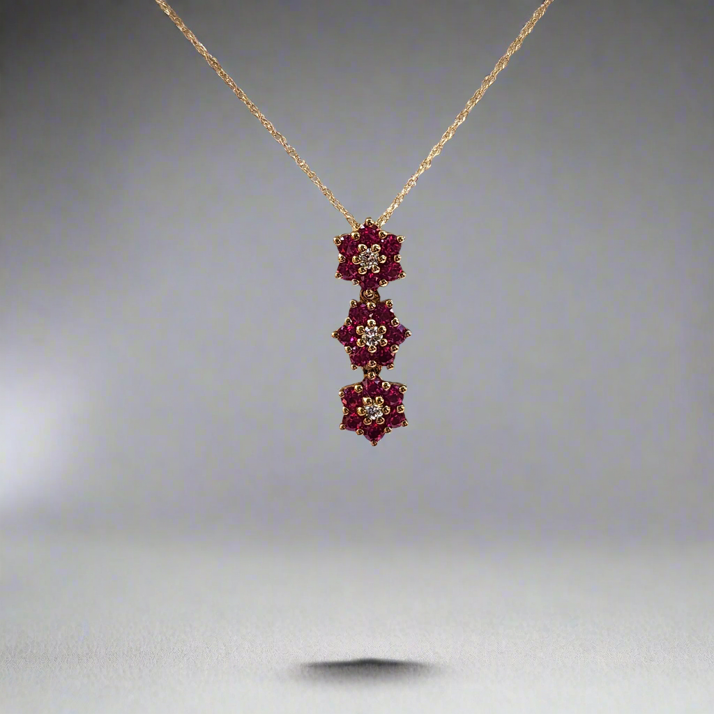 10k Gold Three Diamond and Created Ruby Flower Pendant Necklace