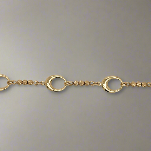 14k Gold Oval Link With Diamond Cut Gold Balls Bracelet