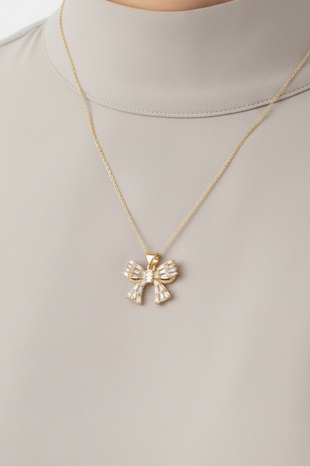 Gold Plated Baguette CZ Bow Pendant Necklace