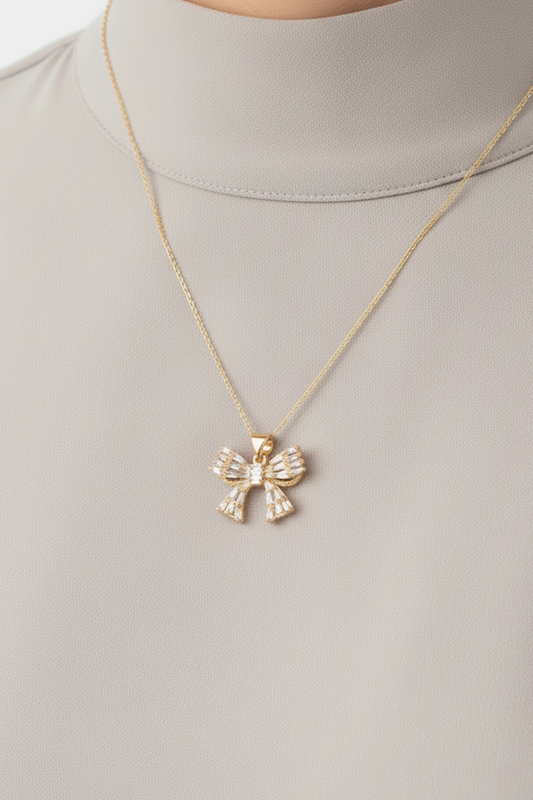 Gold Plated Baguette CZ Bow Pendant Necklace