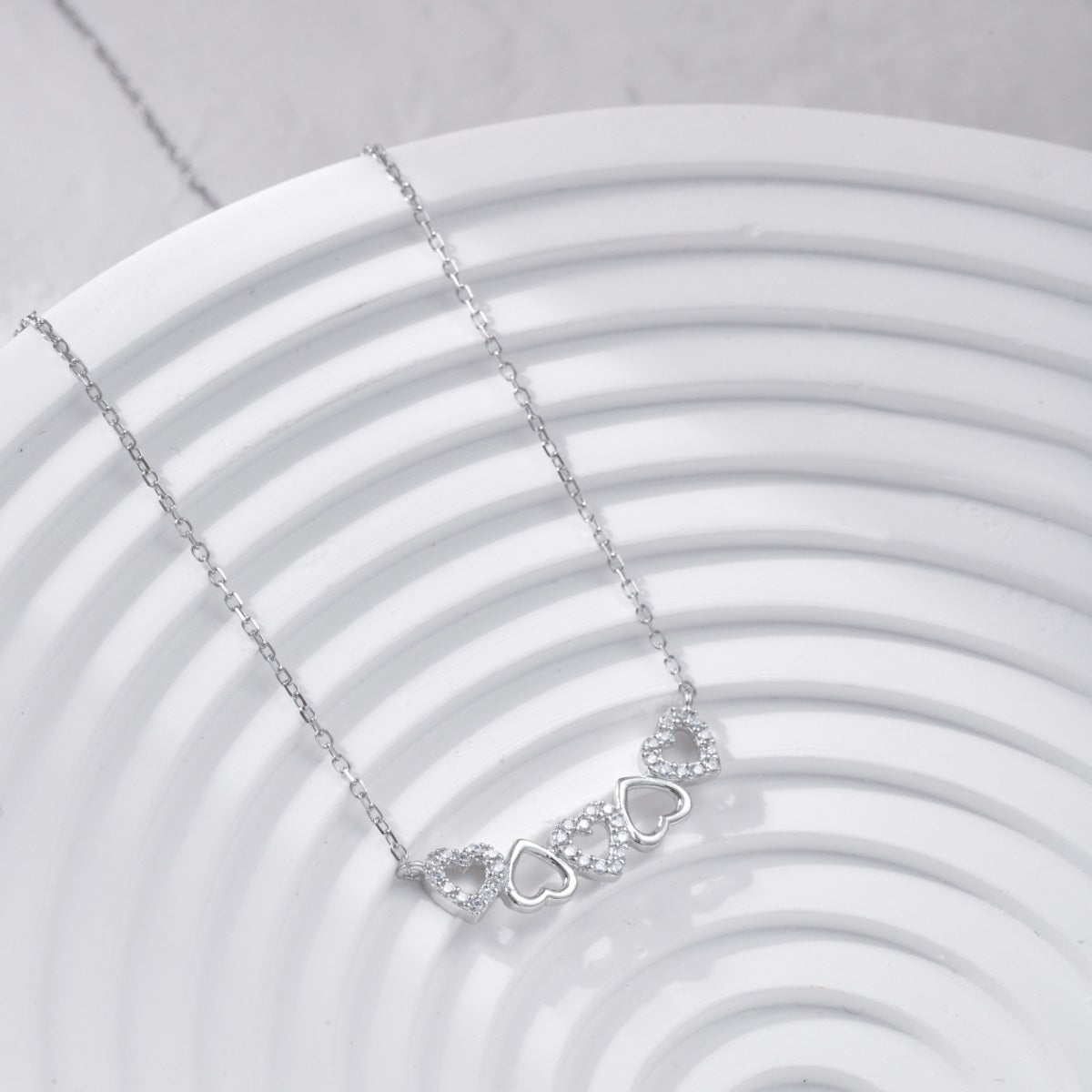 Sterling Silver CZ Five Heart Bar Necklace - HK Jewels