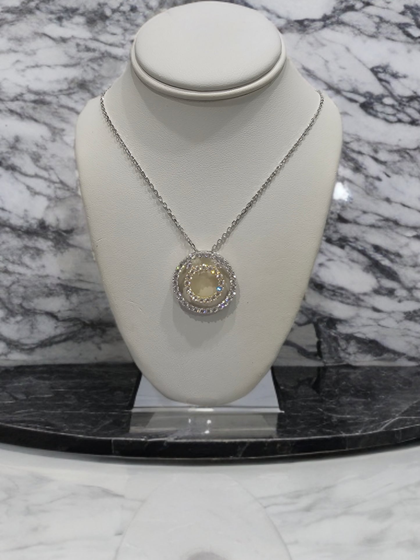 Sterling Silver Two Tone Circle Pendant On Diamond Cut Chain