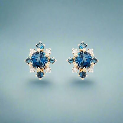 14K Gold Diamond with Light Blue Topaz Stones Stud Earrings