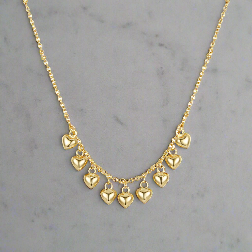 Sterling Silver Gold Plated Dangling Hearts Necklace