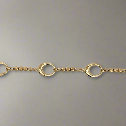 14k Gold Oval Link With Diamond Cut Gold Balls Bracelet