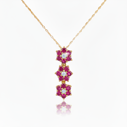 10k Gold Three Diamond and Created Ruby Flower Pendant Necklace