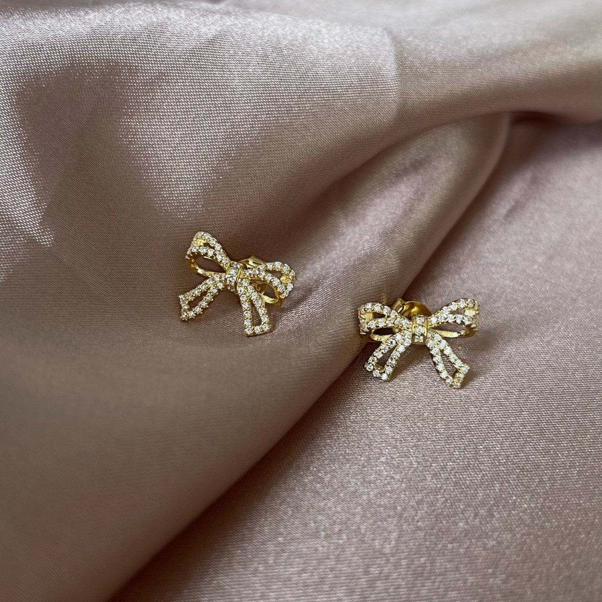 Sterling Silver Micropave Bow Stud Earrings - HK Jewels