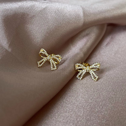 Sterling Silver Micropave Bow Stud Earrings - HK Jewels